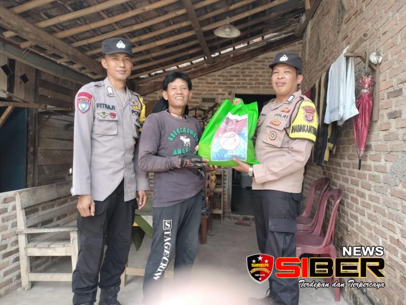 Sambut Hari Bhayangkara, Polsek Pagelaran Salurkan puluhan Paket Sembako untuk Warga Tidak Mampu